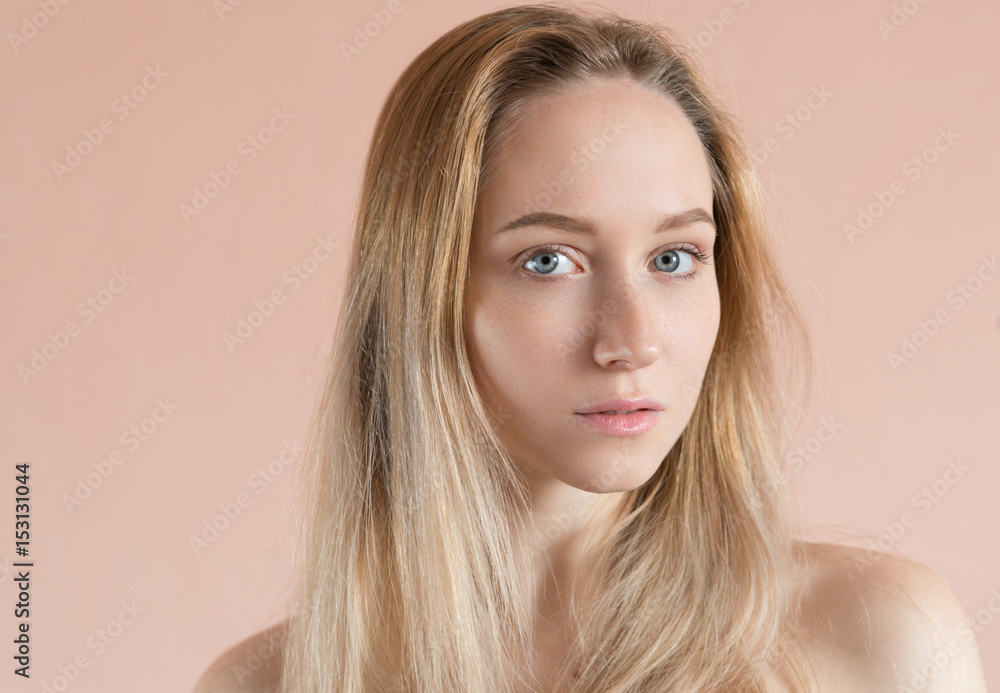 Portrait of a beautiful young woman with blue eyes. Portrait of a beautiful young woman with blue eyes.