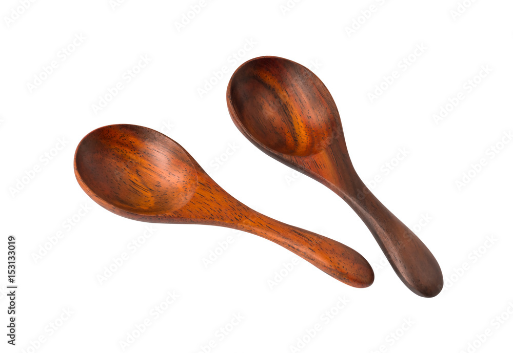 Two small spoons. Made of wood, used for raw materials, such as salt, sugar or pepper. Isolated on white background (with clipping path). Two small spoons. Made of wood, used for raw materials, such as salt, sugar or pepper. Isolated on white background (with clipping path).