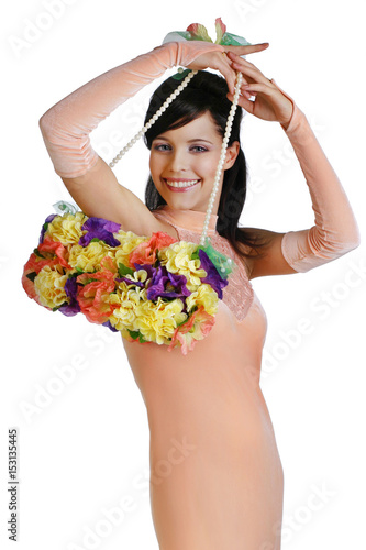 Smiling Girl wearing in gentle apricot dress with flowers hangbag photo