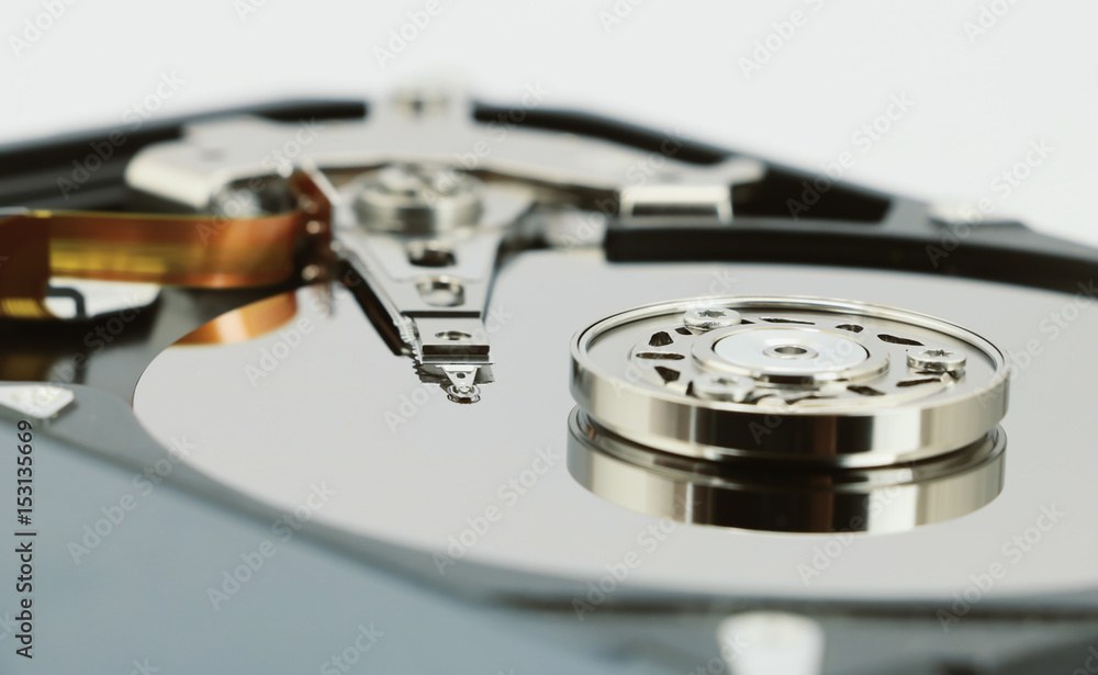 Open cover harddisk and harddisk back - harddisk drive is the data storage for the digital data where is in the your computer isolate on white Open cover harddisk and harddisk back - harddisk drive is the data storage for the digital data where is in the your computer isolate on white
