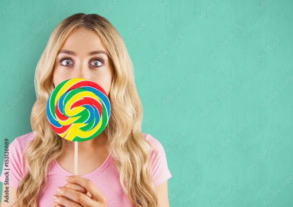 Surprised woman with lollipop candy 