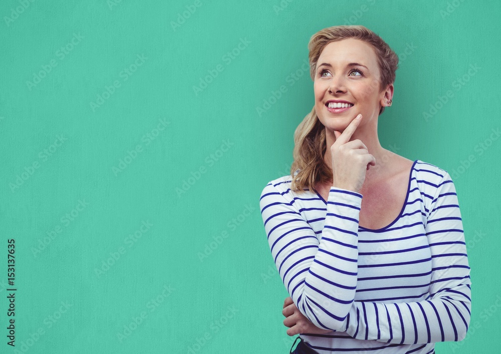Woman looking away over green background Woman looking away over green background