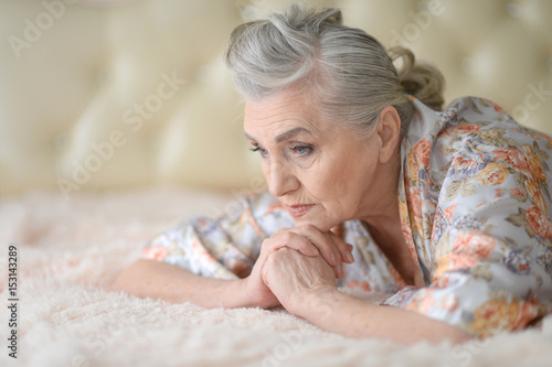 Beautiful sad elderly woman close-up