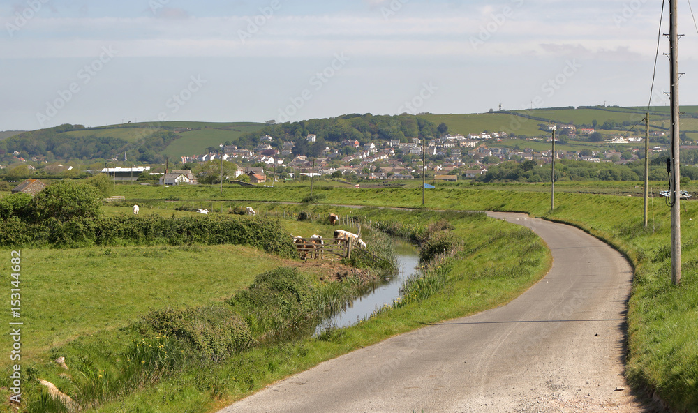 The Village of Braunton in North Devon, UK viewed from the bank of the River Taw