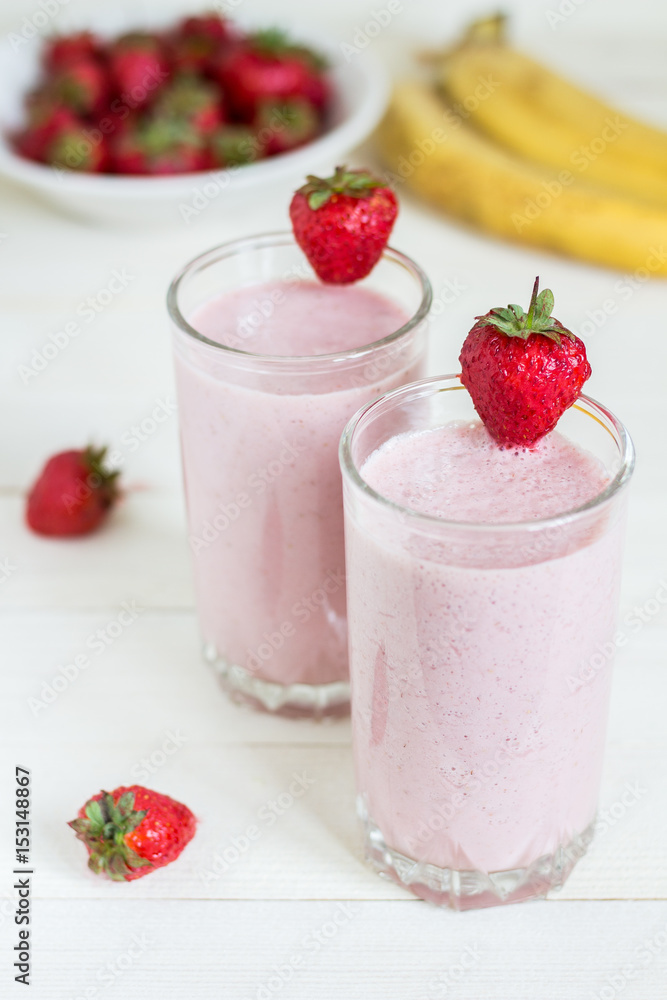 Strawberry banana smoothie healthy breakfast drink in glass Strawberry banana smoothie healthy breakfast drink in glass