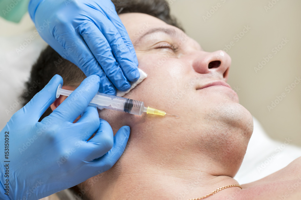 Man passes a course of mesotherapy clinic Man passes a course of mesotherapy clinic