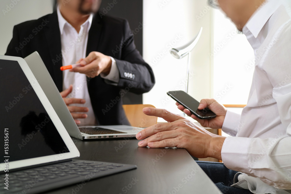 co working team meeting concept,businessman using smart phone and digital tablet and laptop computer in modern office co working team meeting concept,businessman using smart phone and digital tablet and laptop computer in modern office