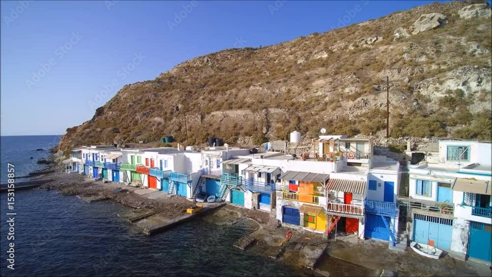 Drone flight over the famous and unique fishermen village named Klima on the island of Milos in Greece.
