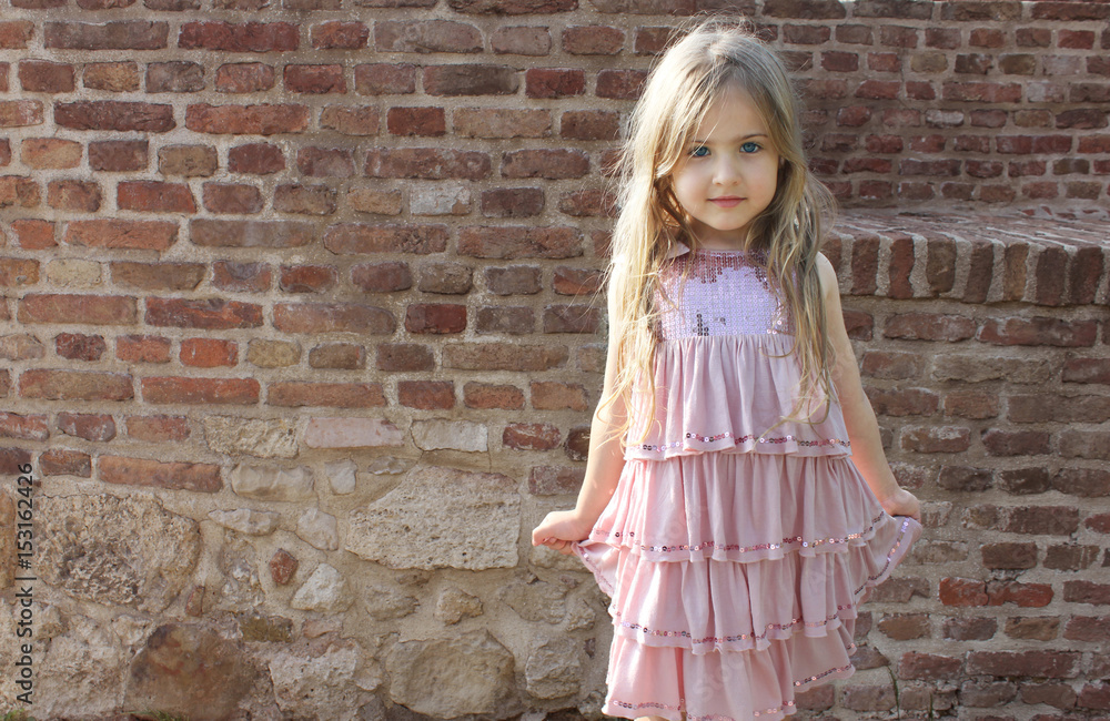 beautiful little girl posing in dress beautiful little girl posing in dress