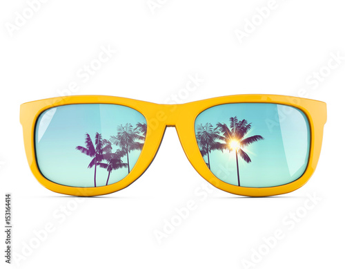 Summer sunglasses with tropical palm tree reflections. photo