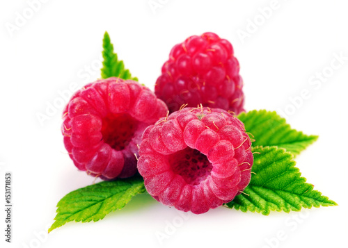  Fresh raspberry with leaf isolated on white background