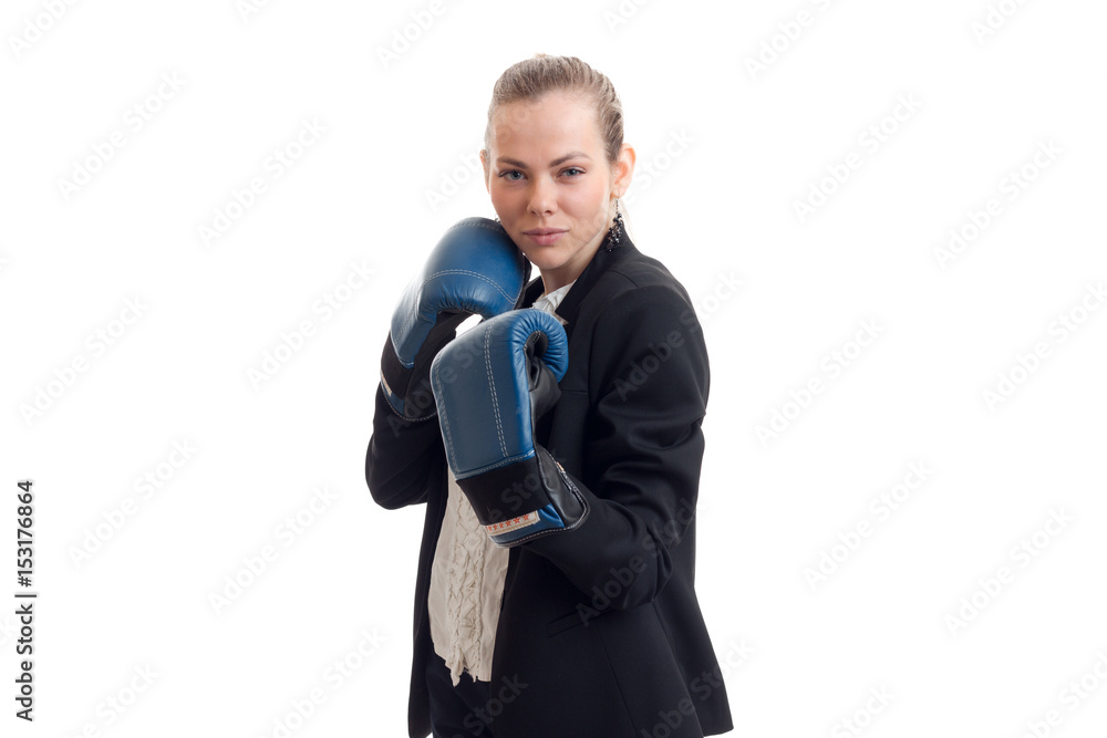 sexy young blonde standing in boxing gloves and blue Office costume close-up sexy young blonde standing in boxing gloves and blue Office costume close-up