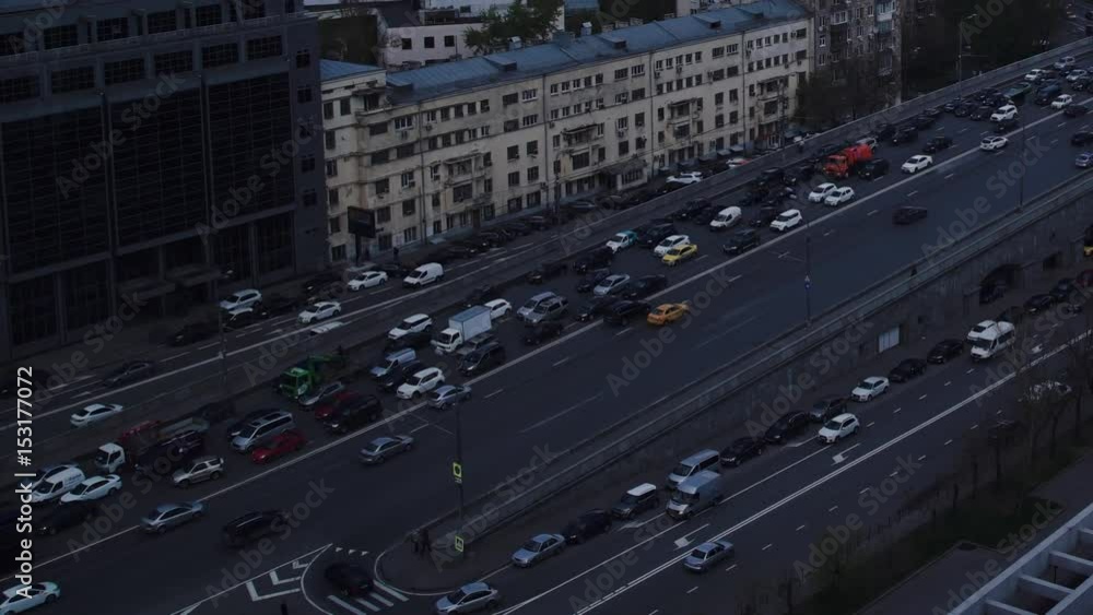 MOSCOW - JUNE 13: Cars stands in traffic jam on the city center, June 13, 2013, Moscow Russia. Moscow Mayor Sobyanin reconstructs suburban railways, to solve problem of traffic jams in 2016. Top view MOSCOW - JUNE 13: Cars stands in traffic jam on the city center, June 13, 2013, Moscow Russia. Moscow Mayor Sobyanin reconstructs suburban railways, to solve problem of traffic jams in 2016. Top view