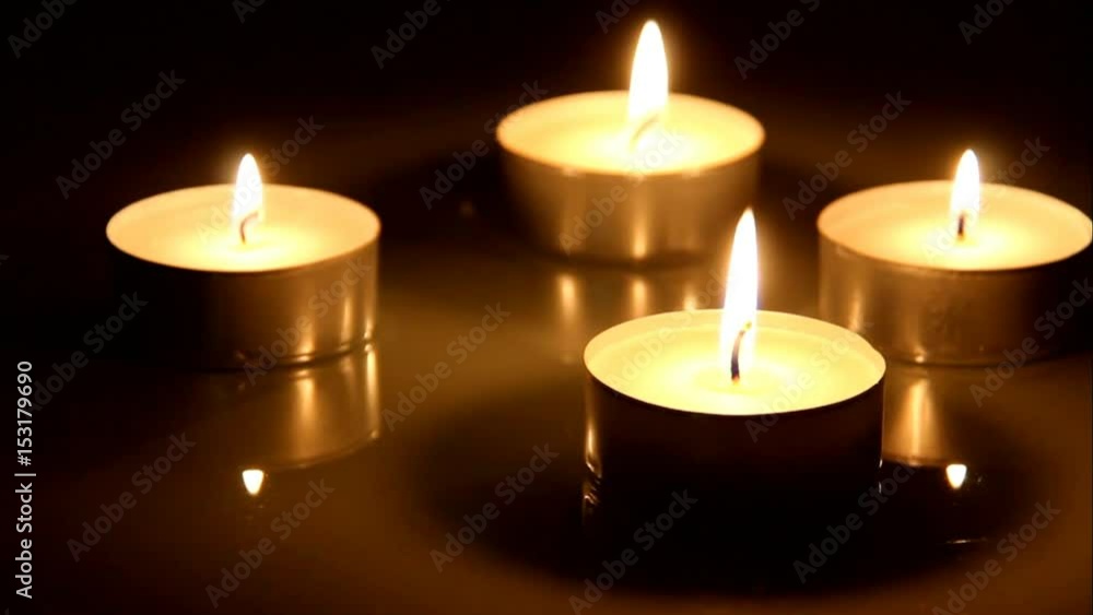 Closeup of Burning Candle on Dark Wooden Table Background Closeup of Burning Candle on Dark Wooden Table Background