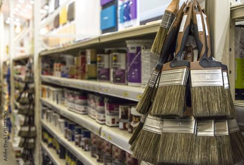Paint brush hanging in the shop of finishing materials