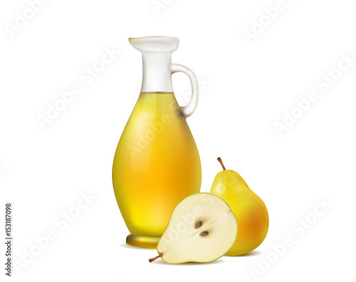 Fresh juice in a glass pitcher and pears on white background
