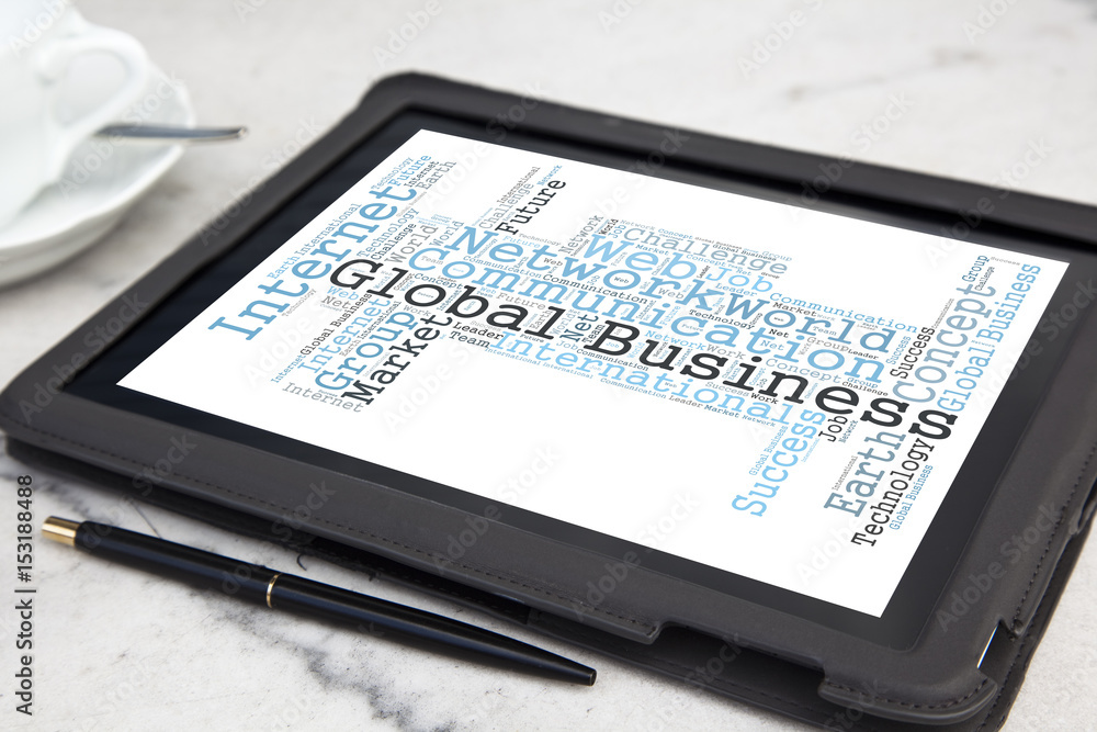 tablet with global business word cloud tablet with global business word cloud
