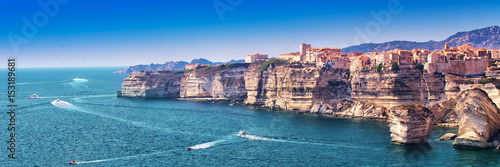 Bonifacio town on beautiful white rock cliff with sea bay, Corsica, France, Europe.