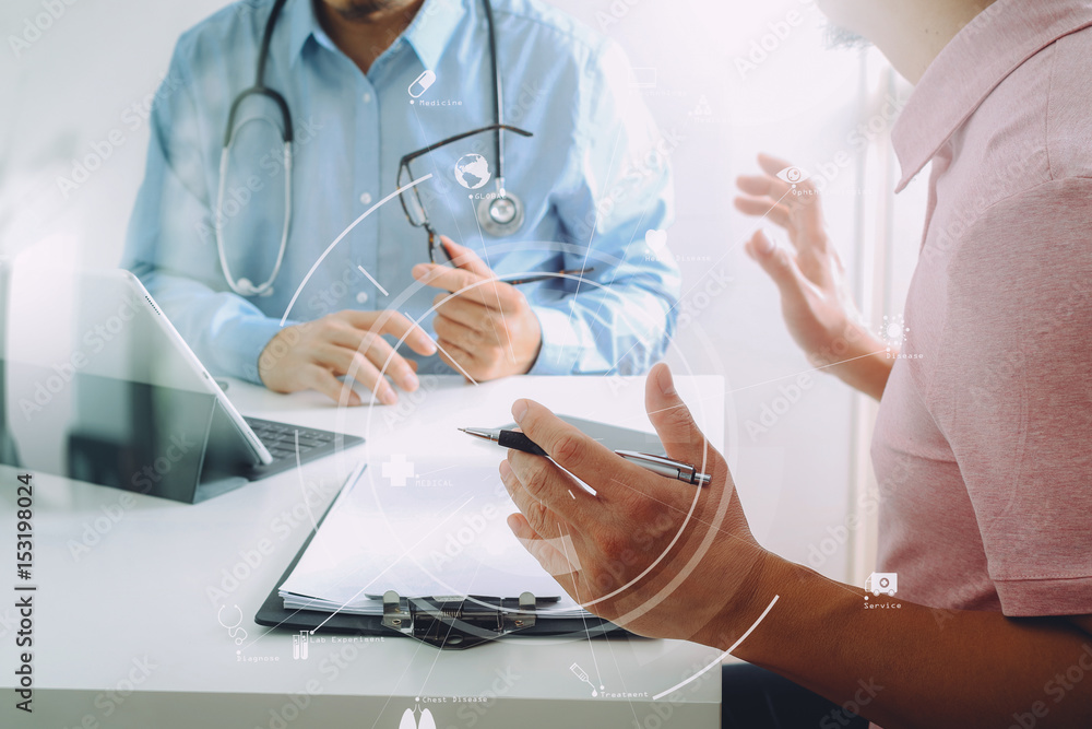 Medical doctor using mobile phone and consulting businessman patient having exam as Hospital professionalism concept Medical doctor using mobile phone and consulting businessman patient having exam as Hospital professionalism concept