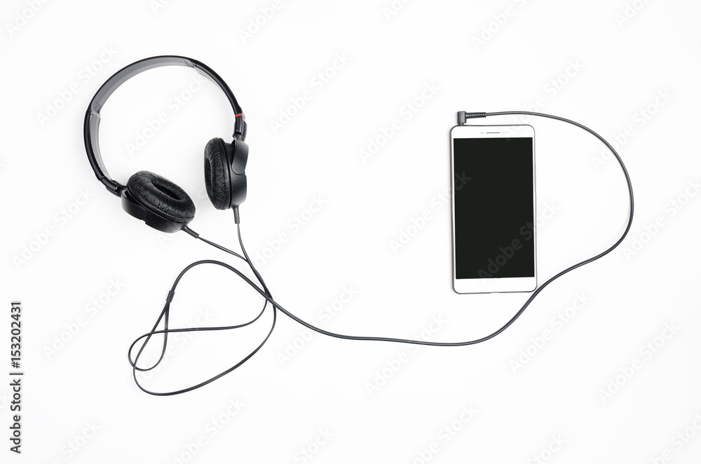 Headphones with smartphone on a white background. Headphones with smartphone on a white background.