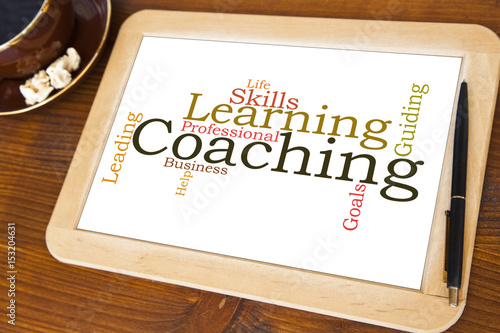 blackboard with coaching word cloud