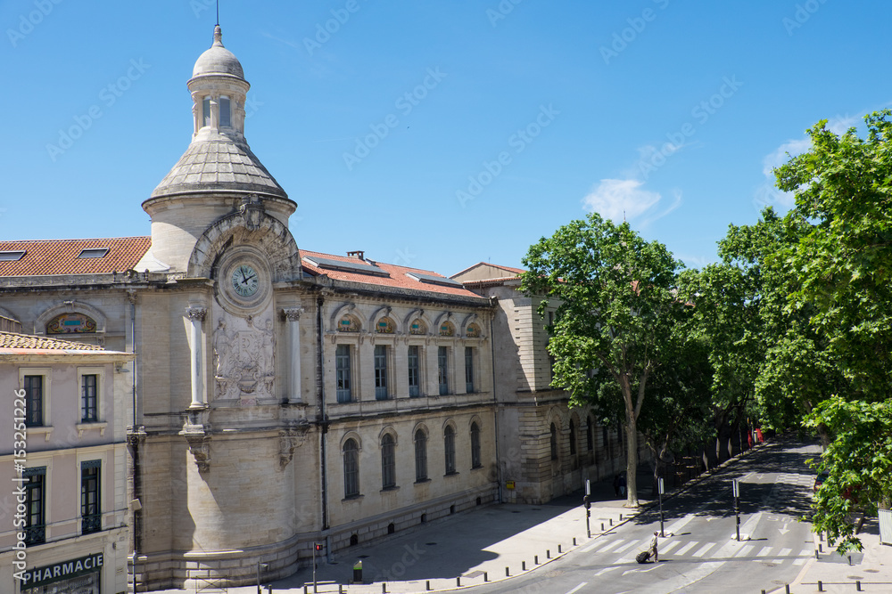 France, Nimes, Street scene and local building architecture.