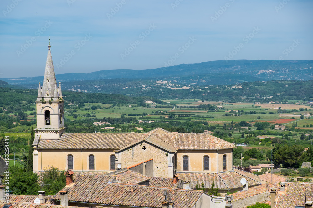 France, Gordes, Provence, Church spire overlooking the valley below.