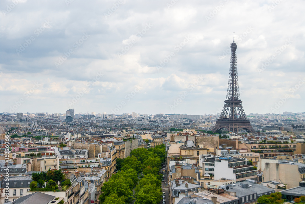 View over Paris Eiffel Tower cloudy sky city center