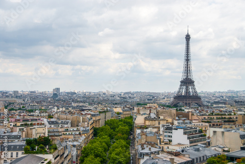 View over Paris Eiffel Tower cloudy sky city center © MXW Photo