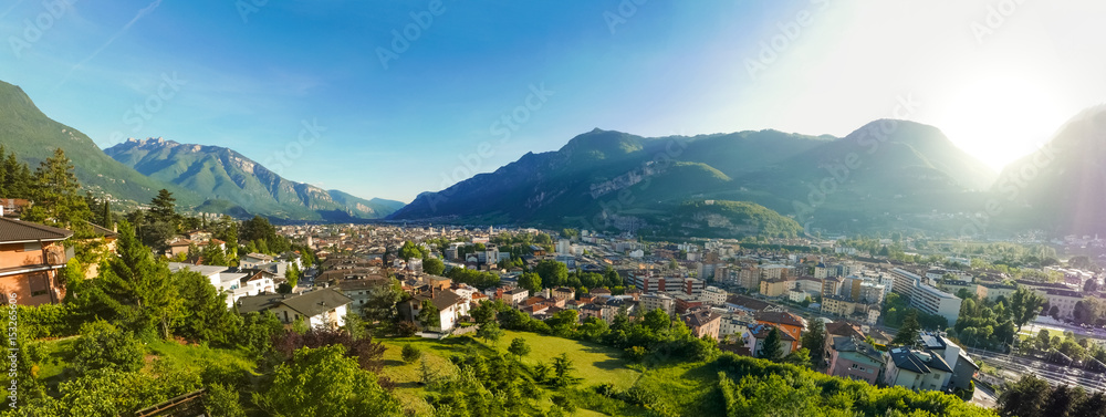 Wide panorama of mountain town during golden hour