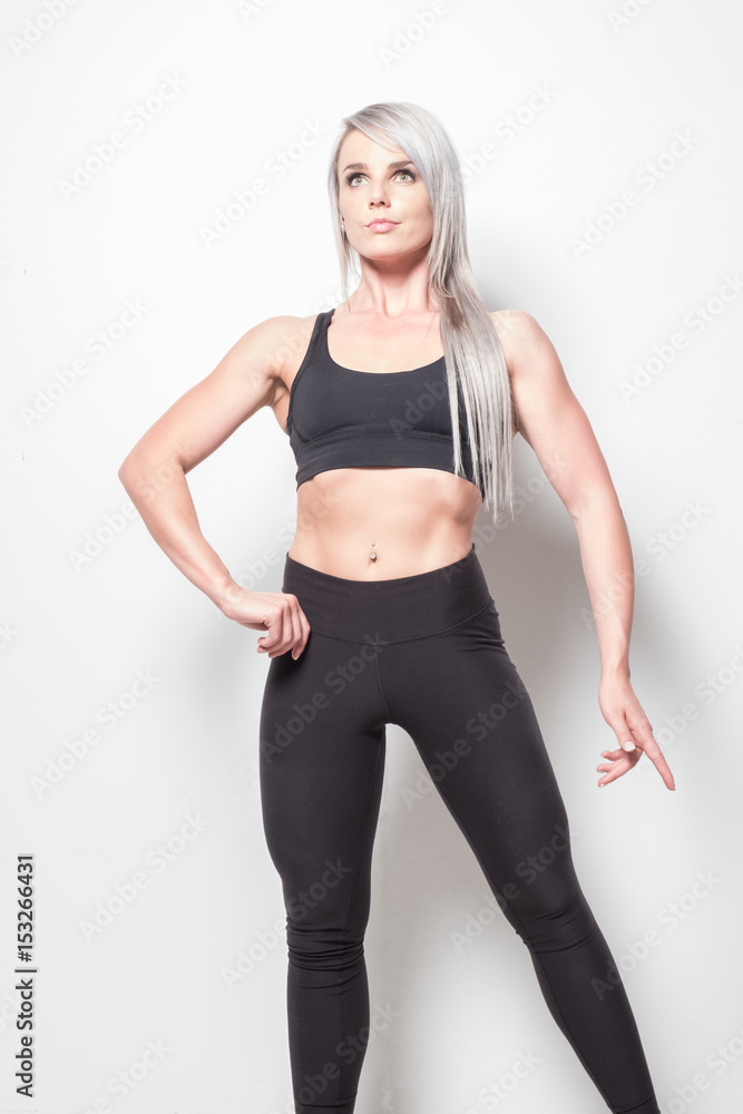 isolated studio shoot of an athletic looking blonde female isolated studio shoot of an athletic looking blonde female