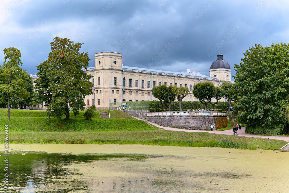 View of the Gatchina Palace from the side of the Palace Park, next to Karpin pond in autumn. St.Petersburg