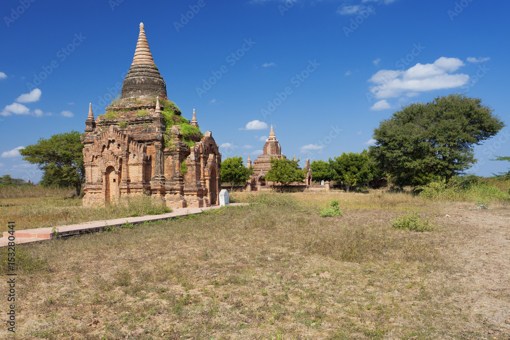 Religious shrines and pagodas in Bagan on a sunny day 