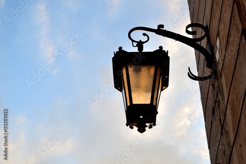 Obraz na płótnie Old street lamp in Lublin illuminated by the sun w salonie