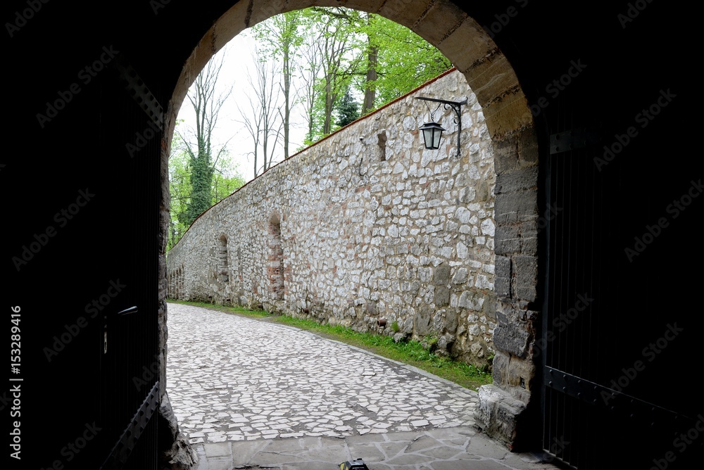 Medieval stone entrance gate to the Benedictine monastery in Tyniec