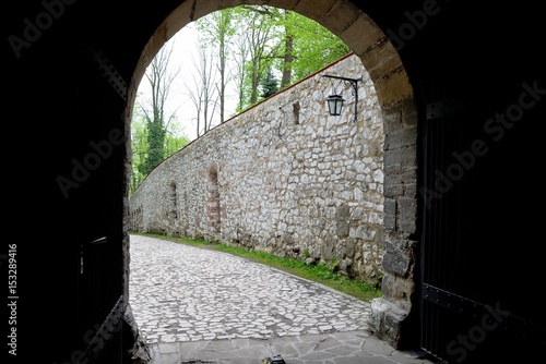 Medieval stone entrance gate to the Benedictine monastery in Tyniec