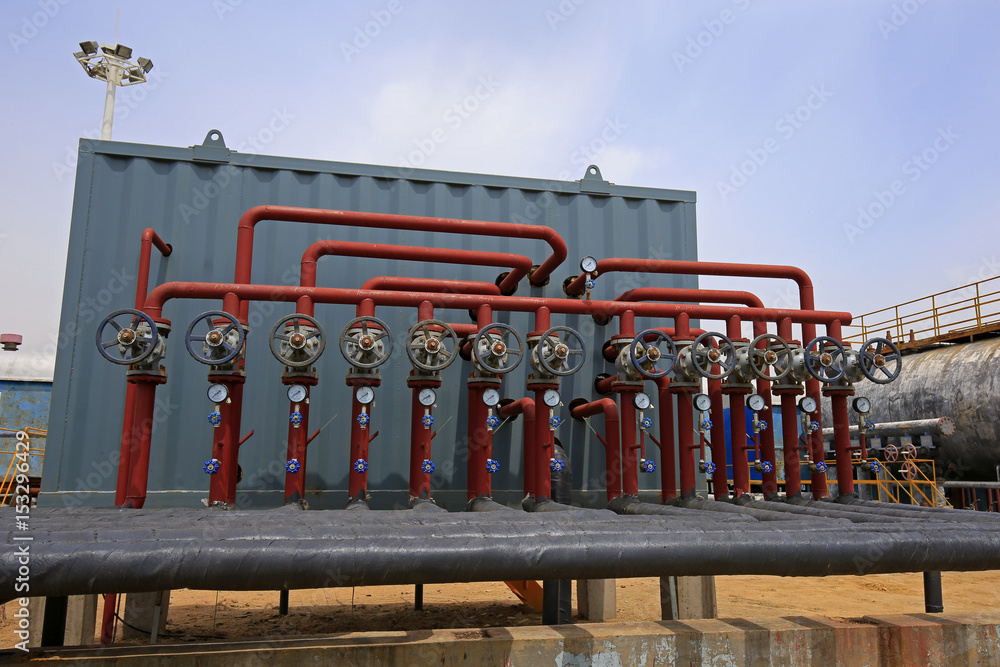 Naklejka premium Oil pipes and valves