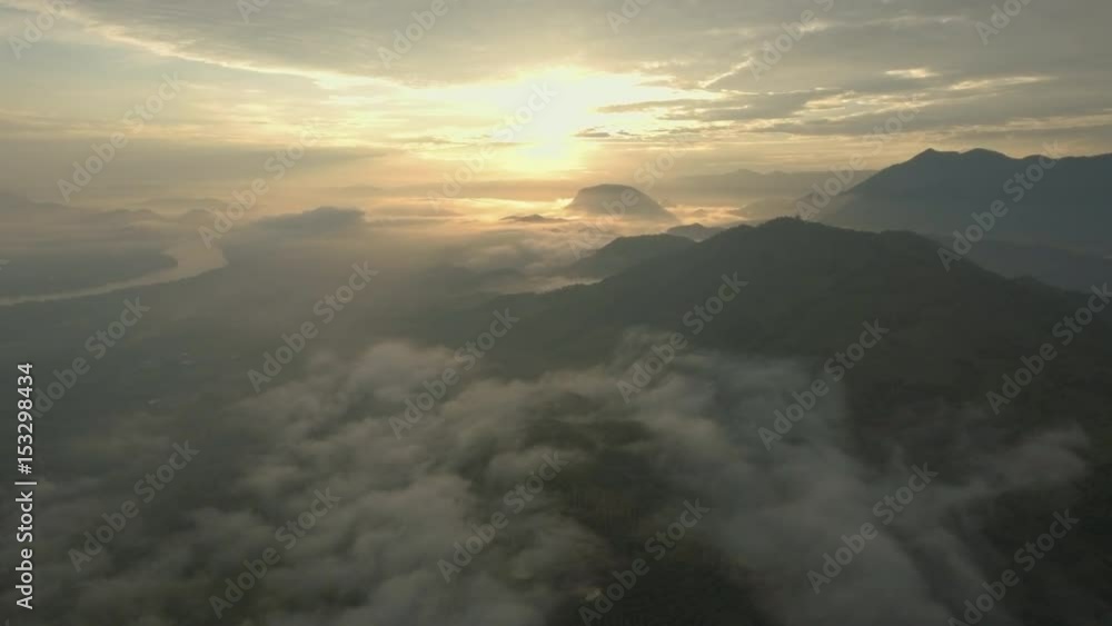 epic sunrise in beautiful valley of Luang Prabang province Laos epic sunrise in beautiful valley of Luang Prabang province Laos