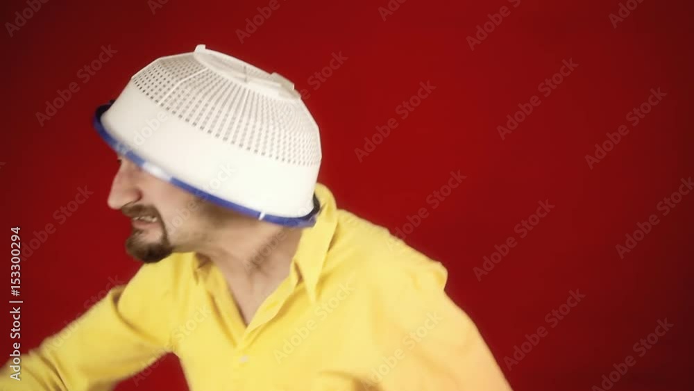 A funny ugly angry crazy man, with a colander on his head, chasing and trying to cut and harm someone with a sharp big knife.
A funny ugly angry crazy man, with a colander on his head, chasing and trying to cut and harm someone with a sharp big knife.