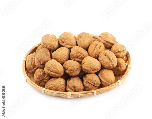 Wicker basket of walnuts isolated