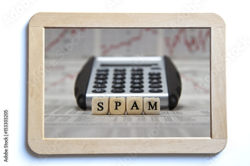 spam word on a isolated board photo