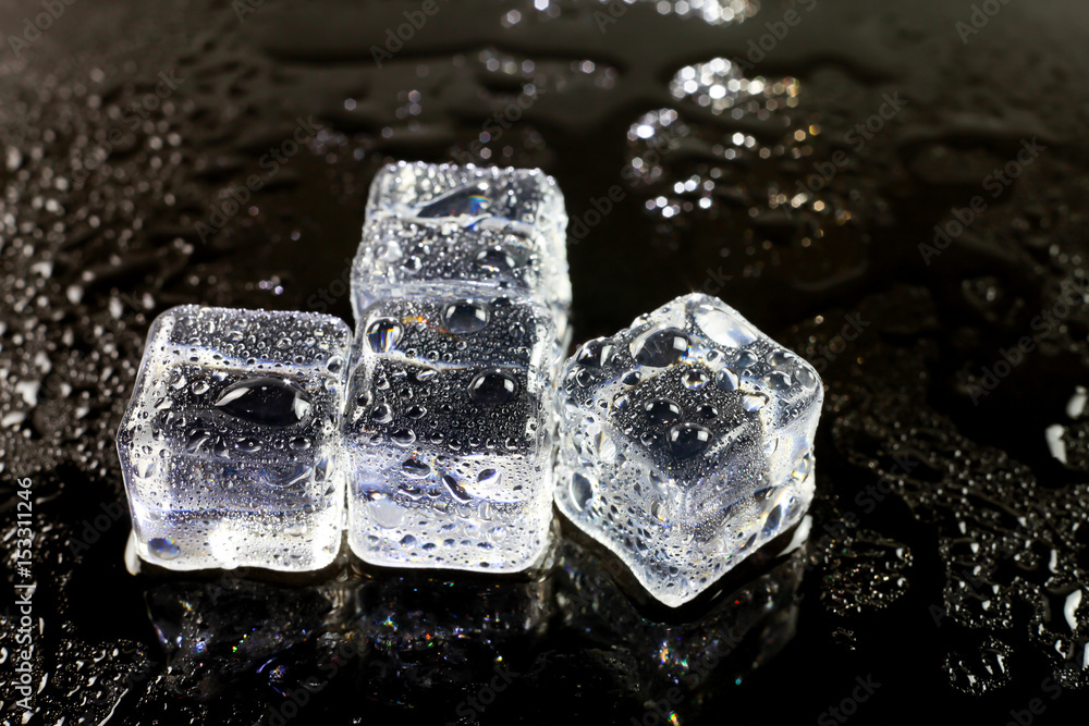 ice cubes on black background. ice cubes on black background.