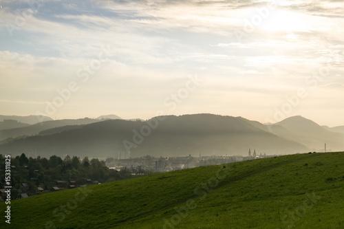 Sunrise and sunset over the hills and town. Slovakia