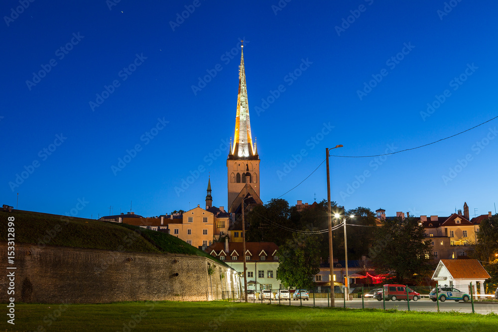 St. Olaf church and fortress bastion at night. Tallinn, Estonia.