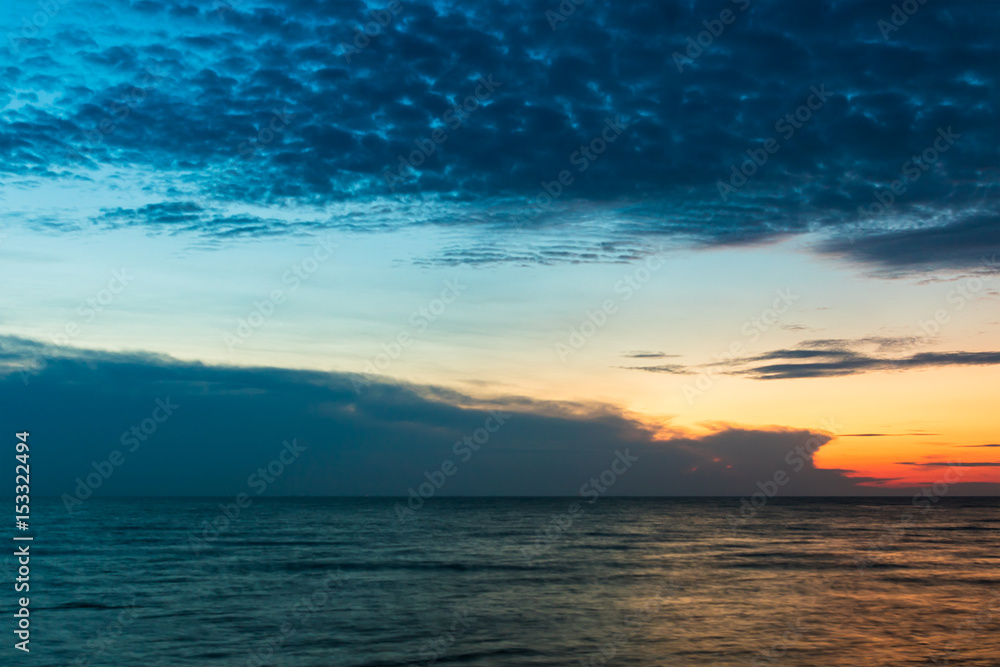 Fototapeta premium Clouds in the blue sky in sunset time