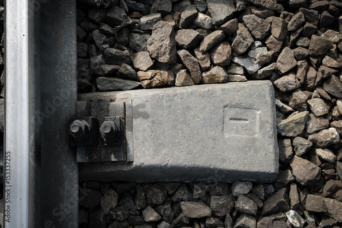 Rail anchor or joint.