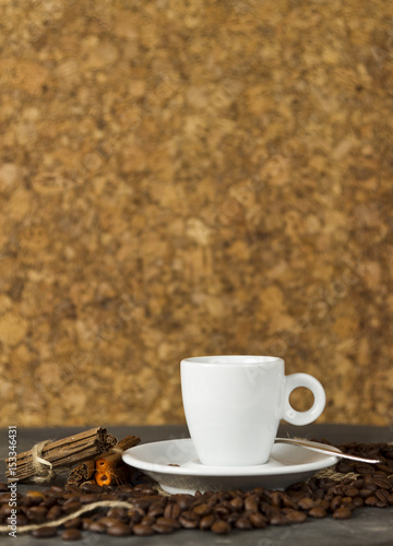 cup of coffee with coffee beans