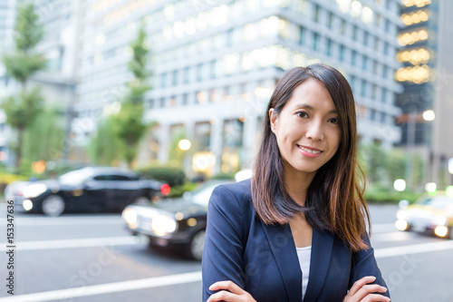 Free Download Asian business woman in Tokyo city - GFXLoad