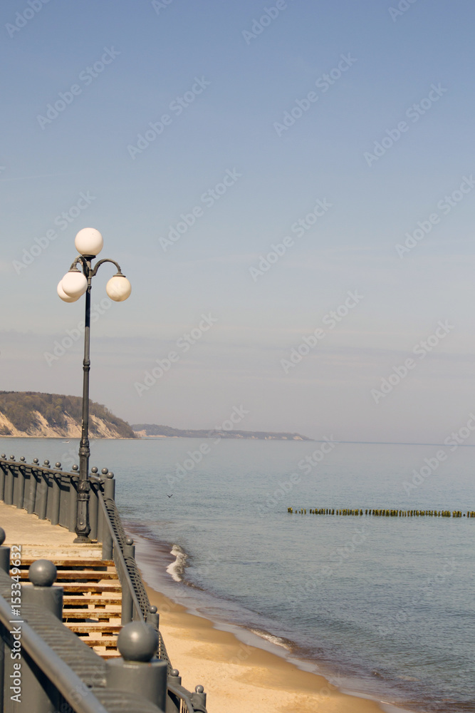 The promenade on the sea, the sun, the water.