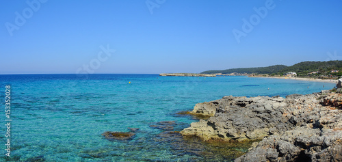 Landscape of the beautiful beach of Saint Tomas with a wonderful turquoise sea  Menorca  Spain